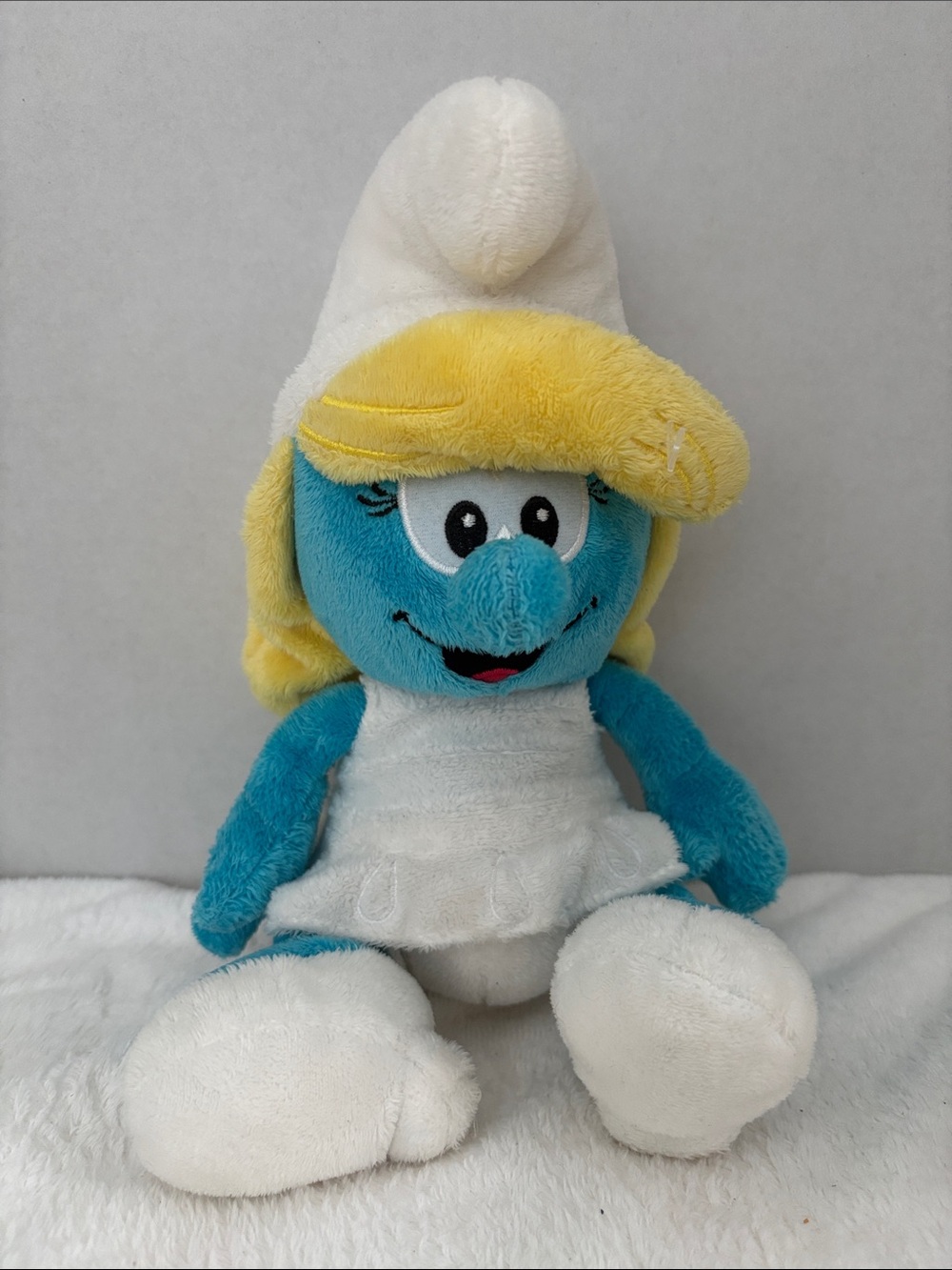 Blue and Yellow Plush Smurf-Inspired Doll with White Outfit